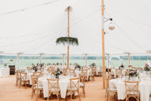 Marquee wedding setup with tables and chair and full setup with glasses